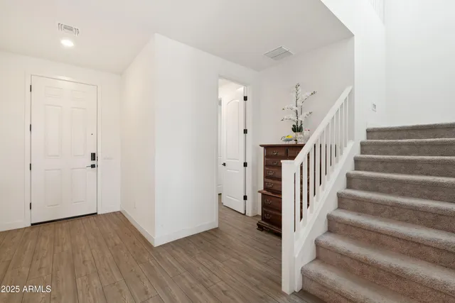 a view of a hallway with a outdoor space