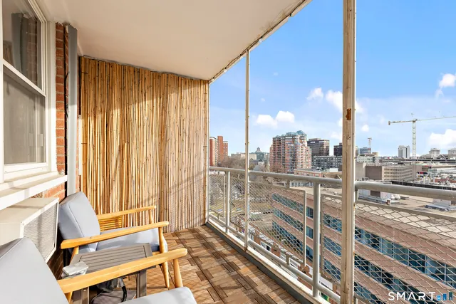 a view of a city from a living room