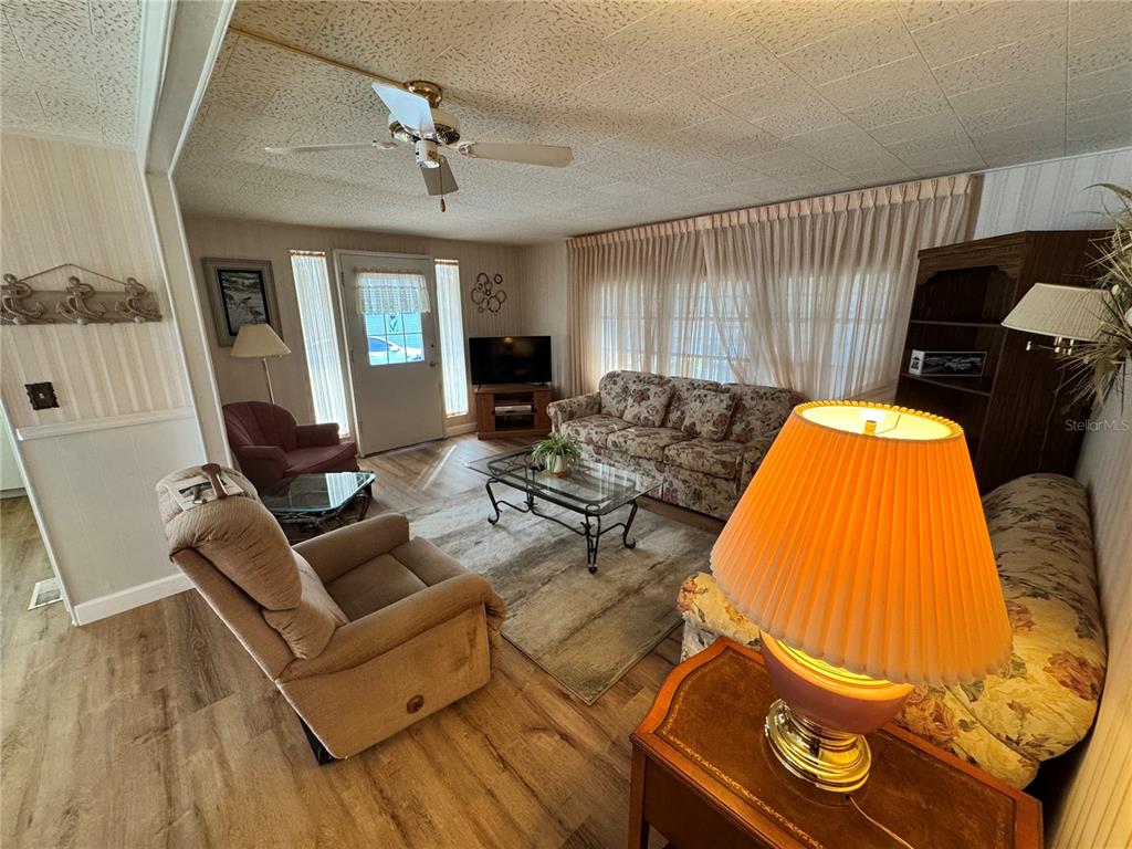 2331 Belleair Road, Unit 804 Clearwater, FL 33764 - Photo 12 of 37 a living room with furniture and a fireplace