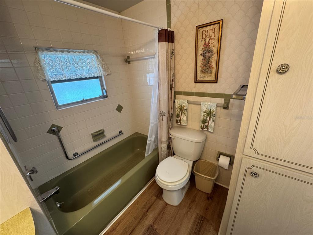 2331 Belleair Road, Unit 804 Clearwater, FL 33764 - Photo 23 of 37 a bathroom with a toilet sink and shower