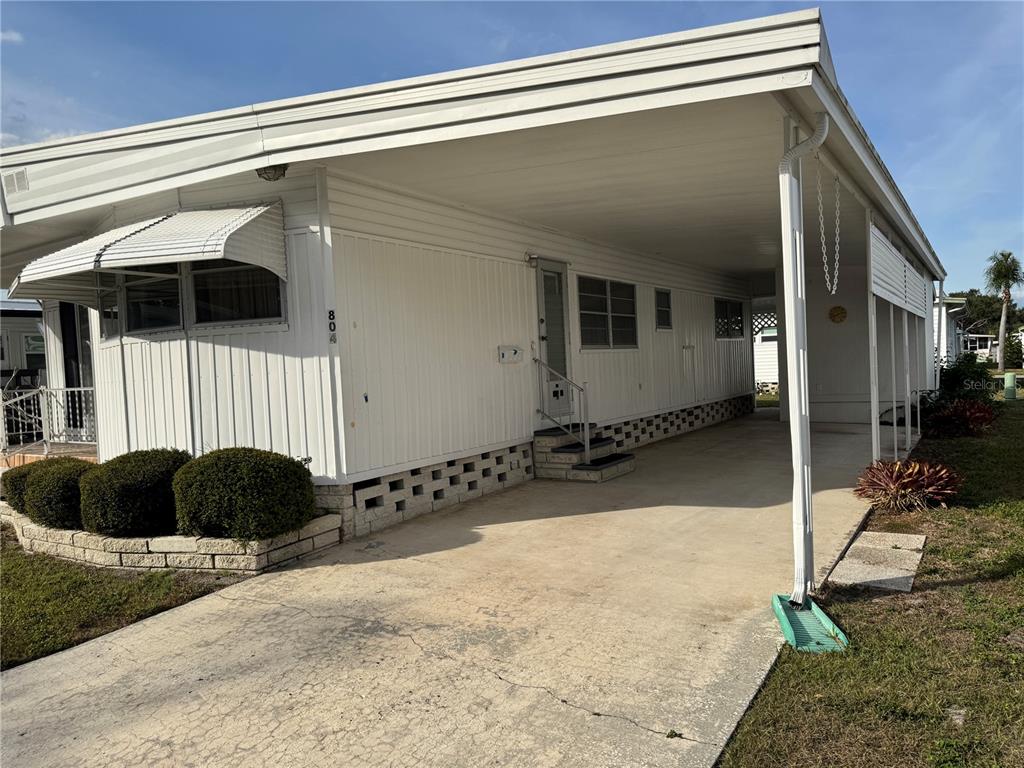 2331 Belleair Road, Unit 804 Clearwater, FL 33764 - Photo 3 of 37 a view of a back yard of the house