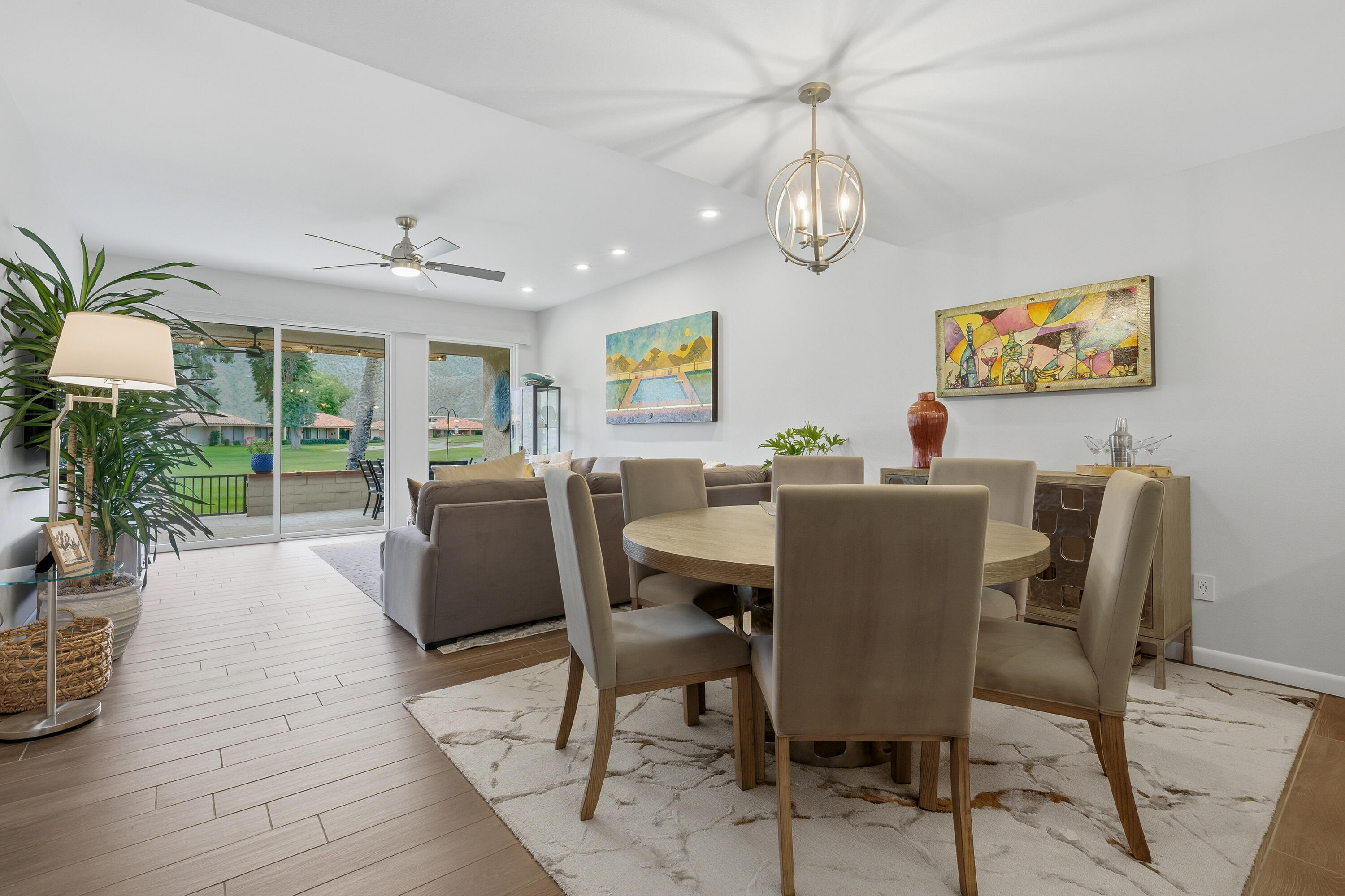 24 Palma Drive Rancho Mirage, CA 92270 - Photo 11 of 40 a view of a dining room with furniture window and wooden floor
