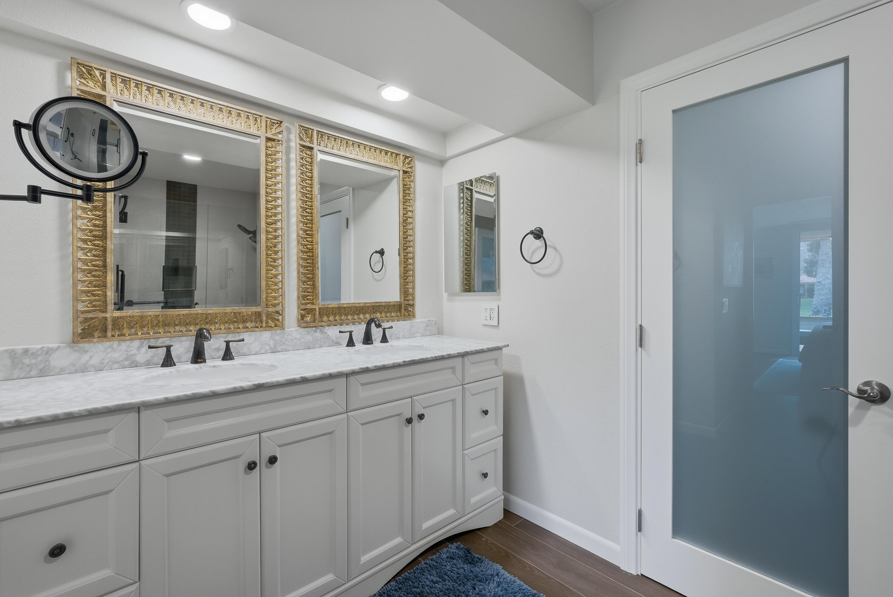 24 Palma Drive Rancho Mirage, CA 92270 - Photo 24 of 40 a bathroom with a granite countertop sink and a mirror