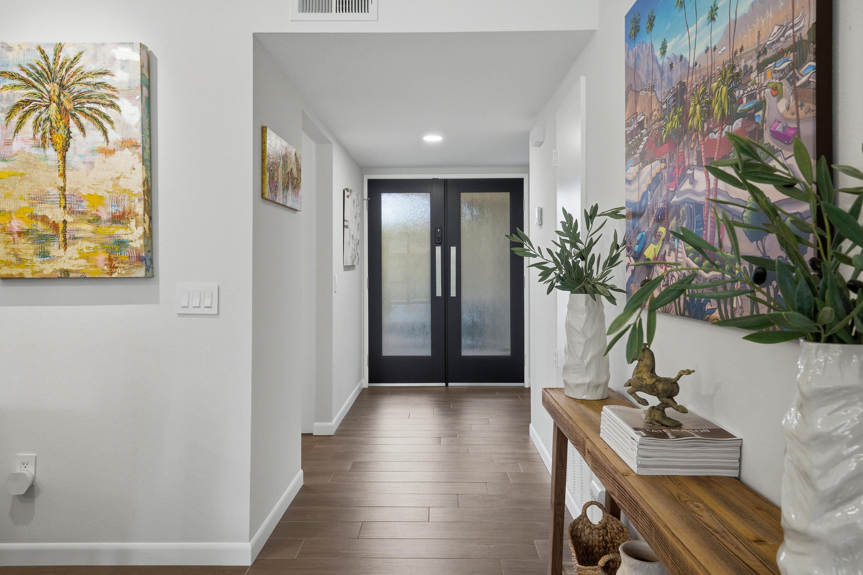 24 Palma Drive Rancho Mirage, CA 92270 - Photo 6 of 40 a view of entryway with wooden floor