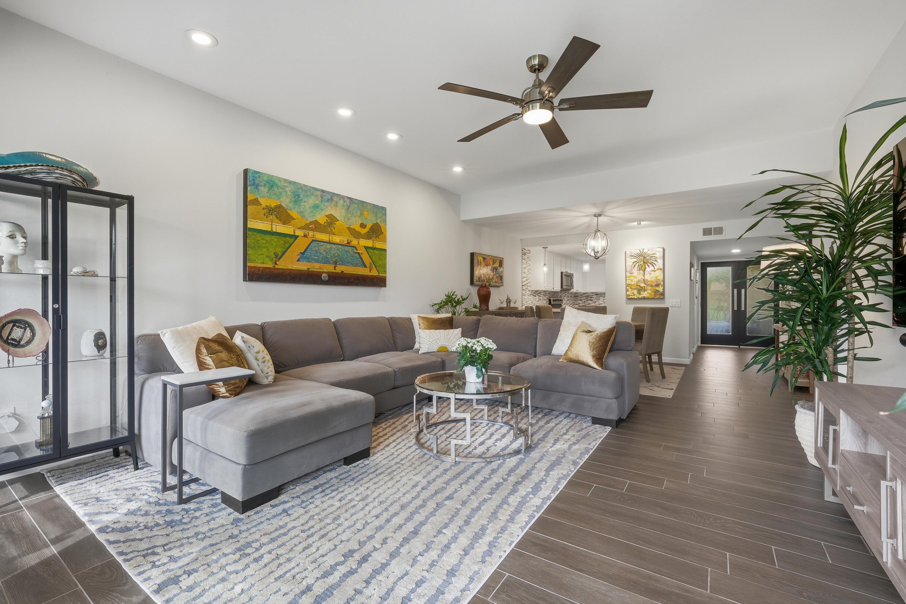 24 Palma Drive Rancho Mirage, CA 92270 - Photo 8 of 40 a living room with furniture and a large window