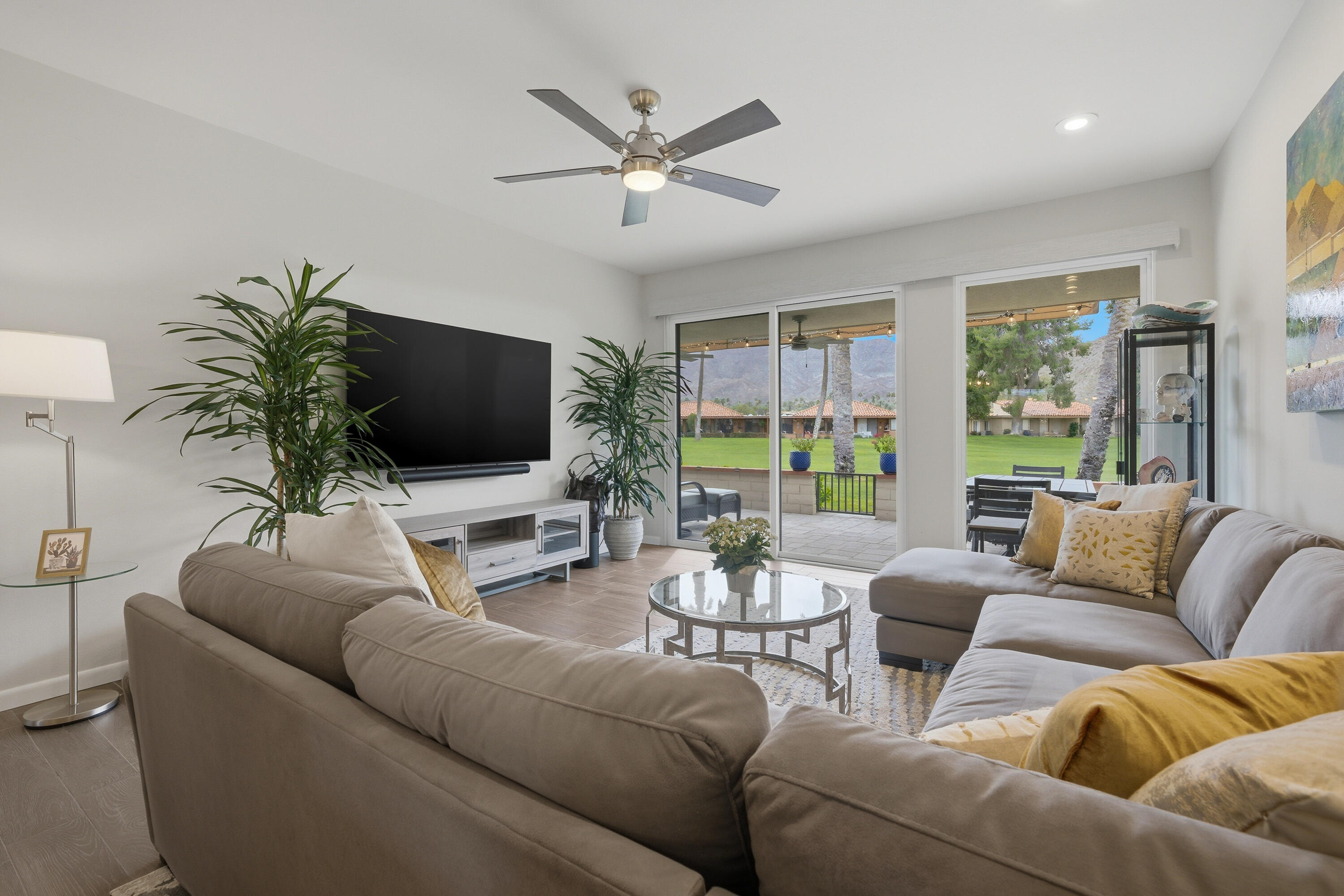 24 Palma Drive Rancho Mirage, CA 92270 - Photo 9 of 40 a living room with furniture and a flat screen tv