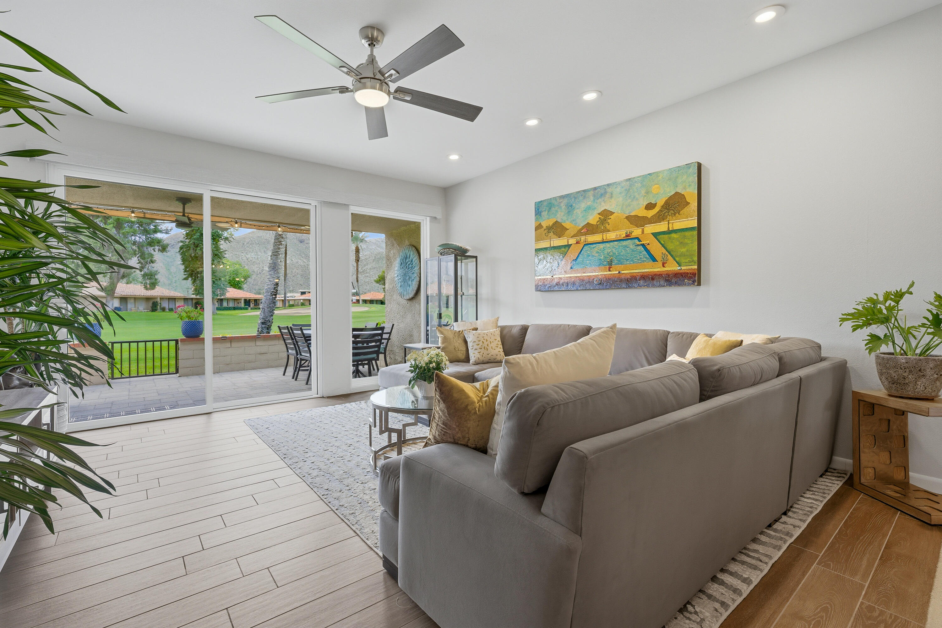 24 Palma Drive Rancho Mirage, CA 92270 - Photo 10 of 40 a living room with furniture and a large window