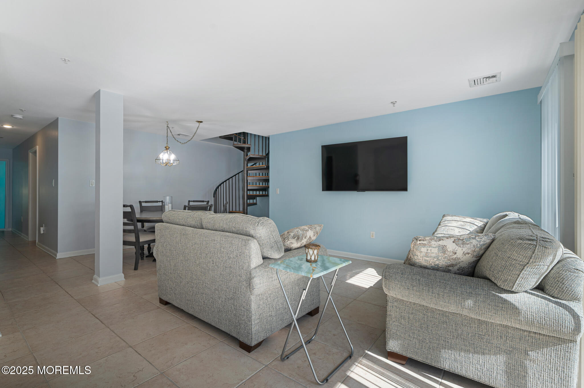 33 Sumner Avenue, Unit 5B RENTAL Seaside Heights, NJ 08751 - Photo 27 of 37 a living room with furniture and a flat screen tv