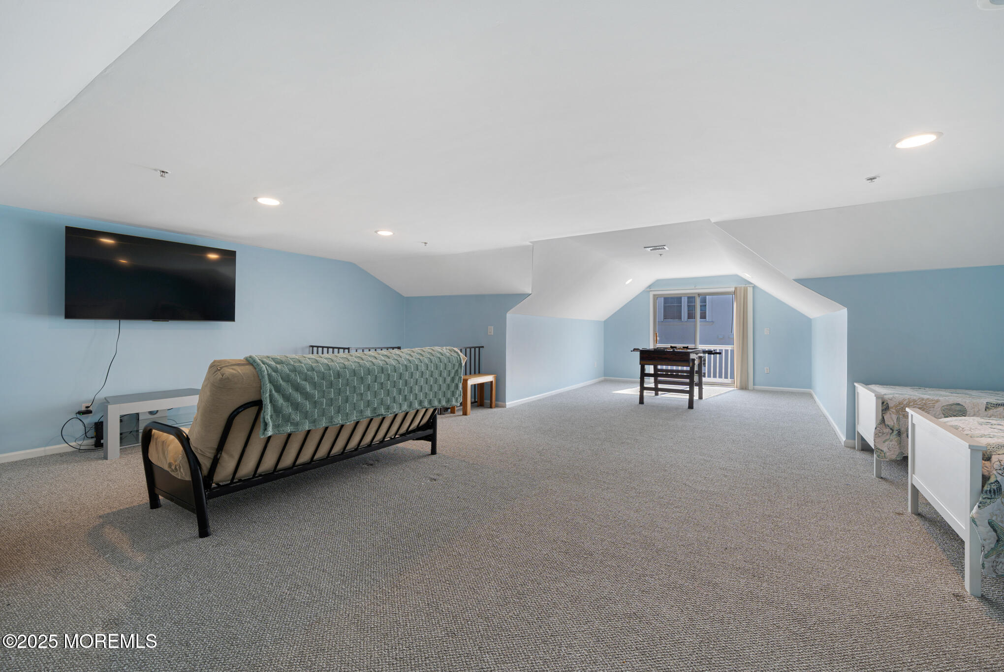 33 Sumner Avenue, Unit 5B RENTAL Seaside Heights, NJ 08751 - Photo 30 of 37 a living room with furniture and a flat screen tv