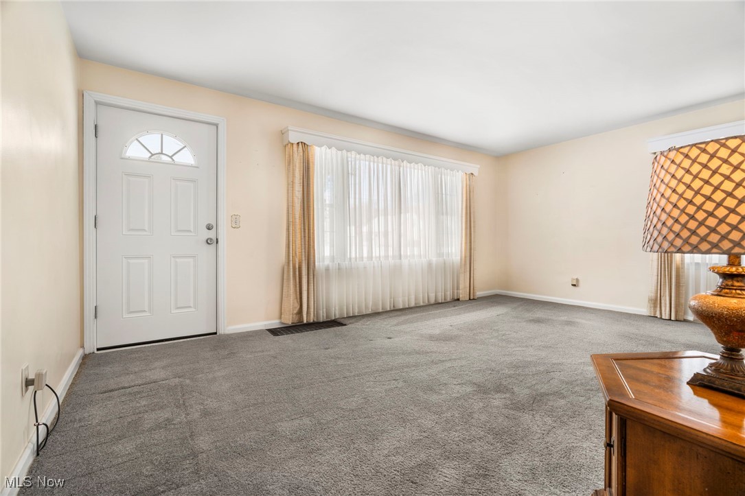 3002 Joseph Street Northwest Canton, OH 44708 - Photo 6 of 18 Entryway with carpet flooring and plenty of natural light