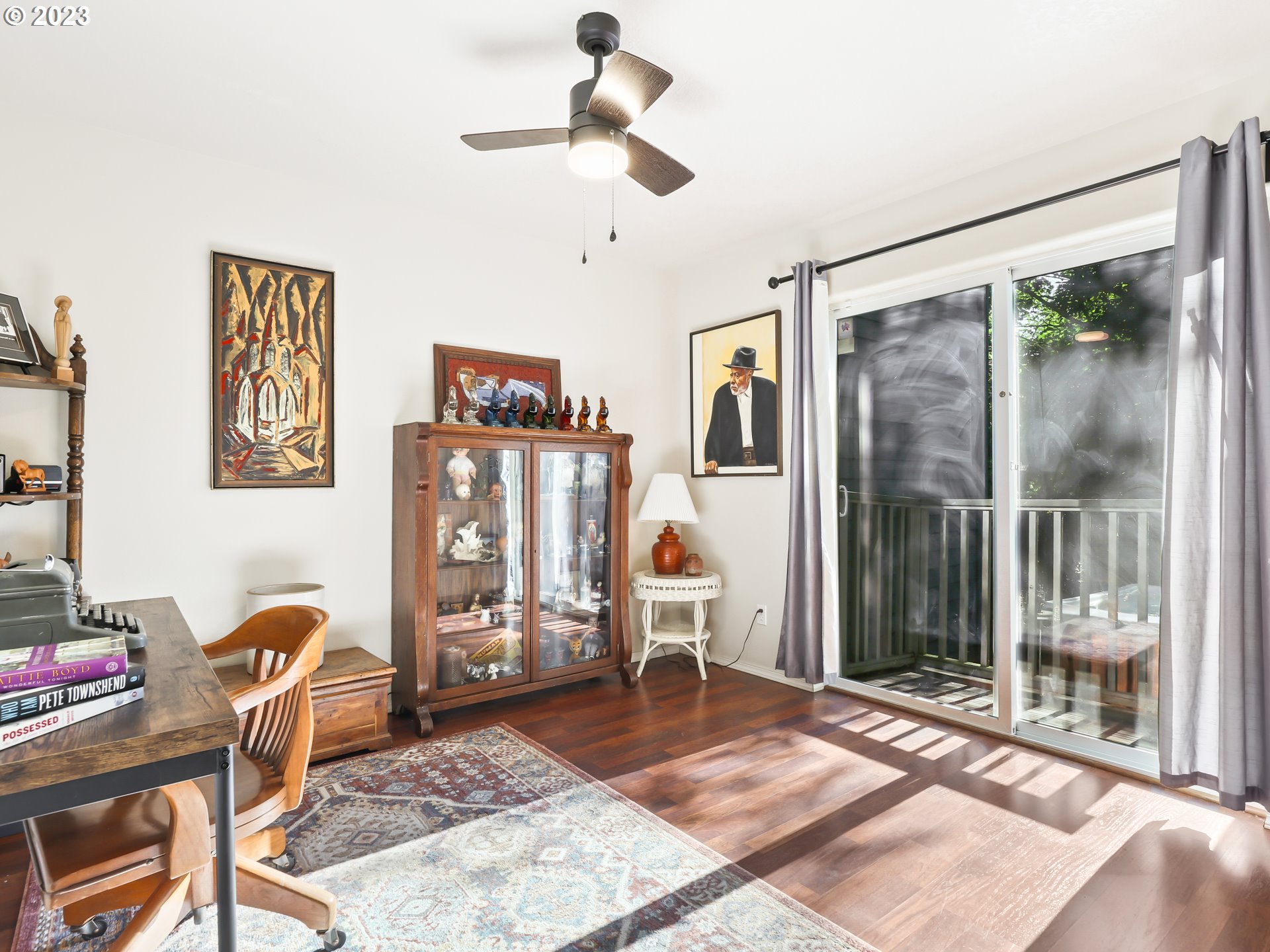 15820 Northeast Beech Street Portland, OR 97230 - Photo 13 of 28 a living room with furniture a rug and a chandelier