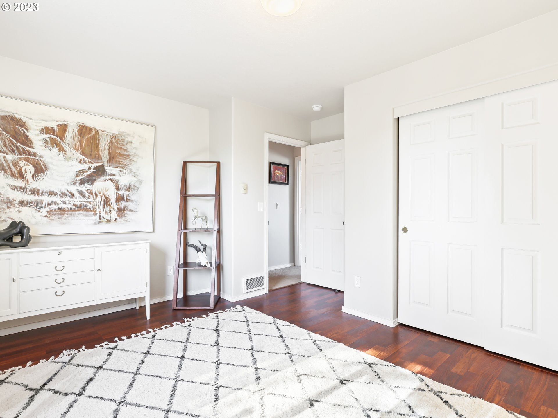 15820 Northeast Beech Street Portland, OR 97230 - Photo 21 of 28 a bedroom with a bed and a window