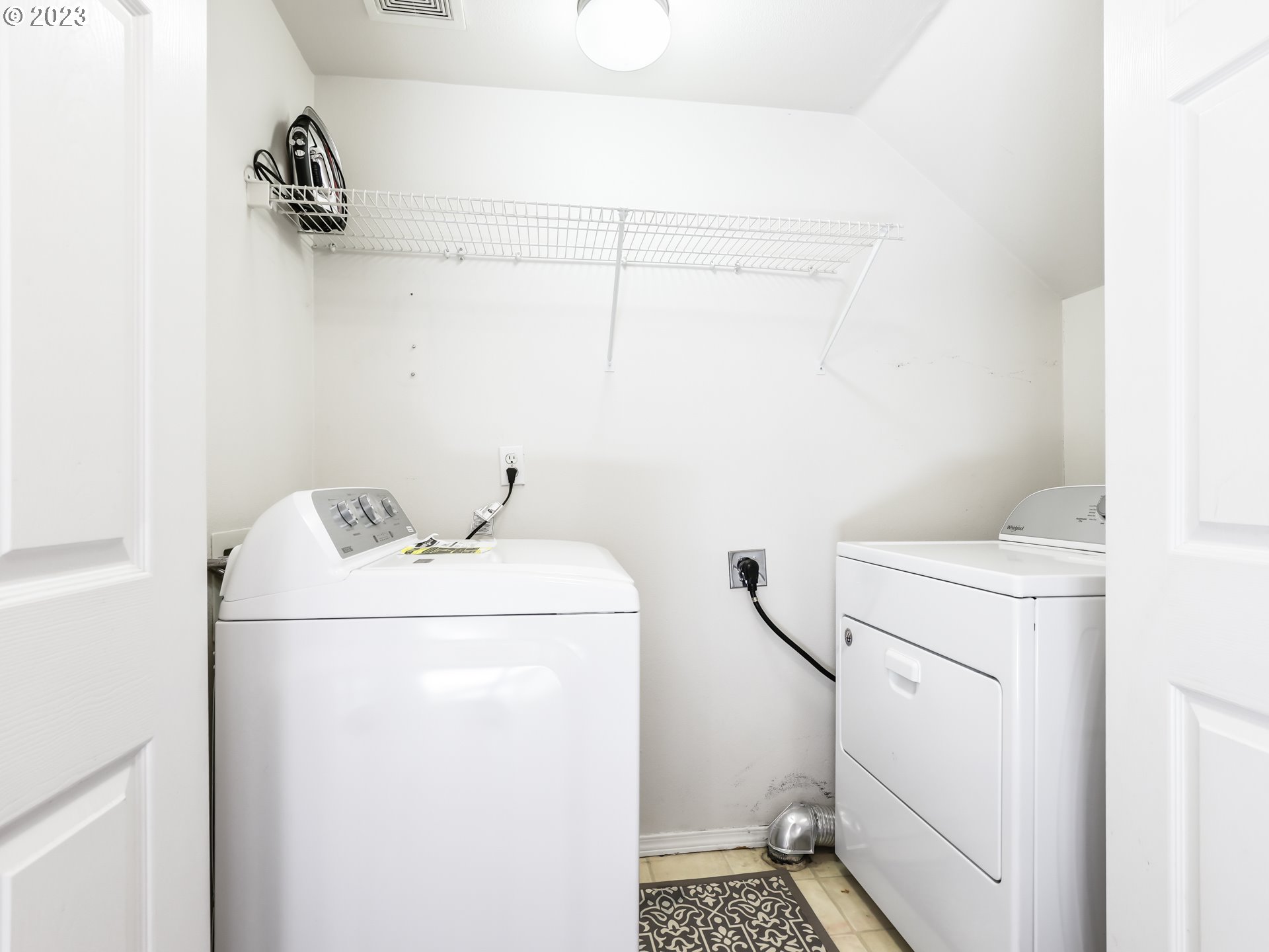 15820 Northeast Beech Street Portland, OR 97230 - Photo 22 of 28 a utility room with dryer and washer