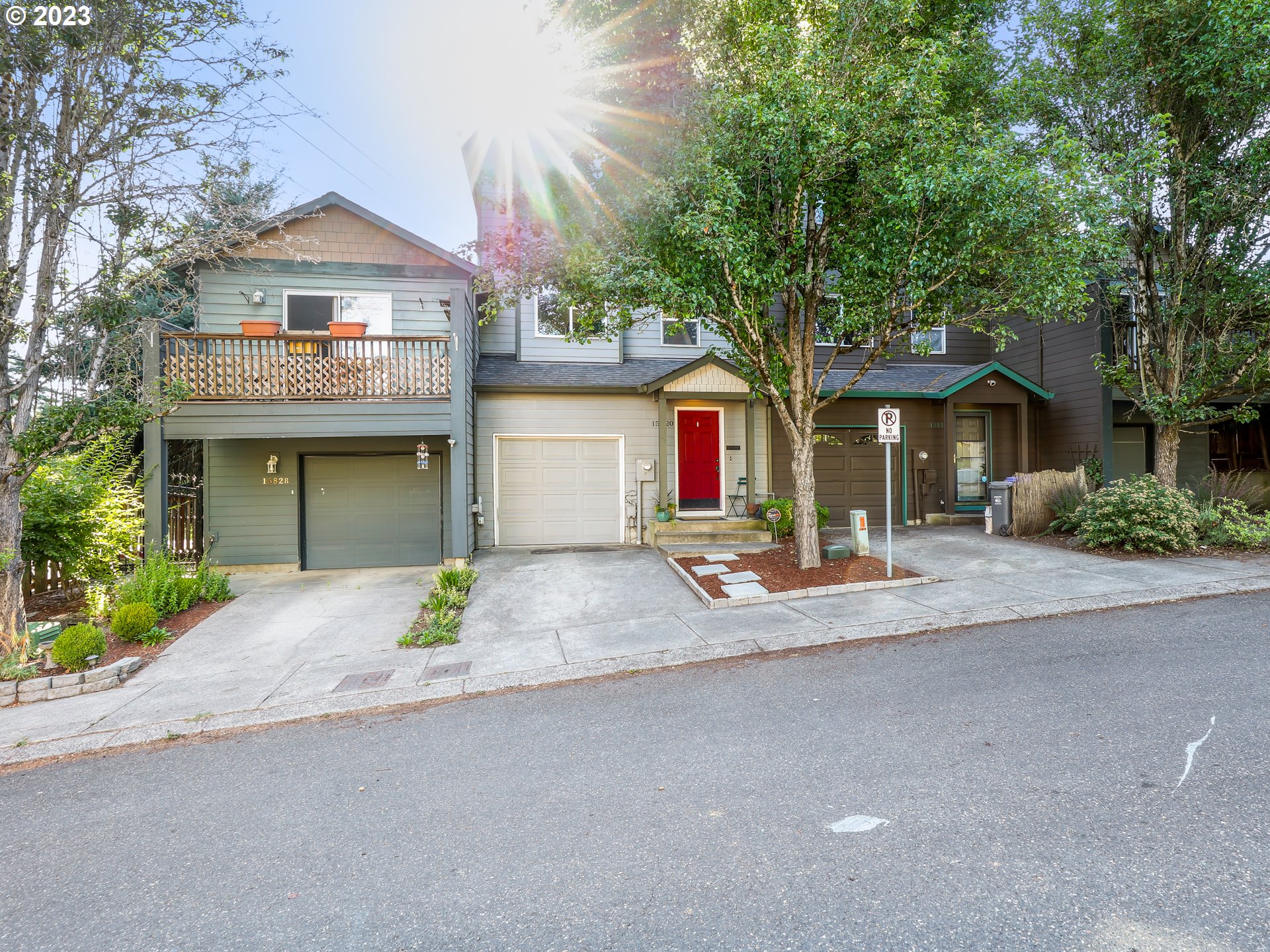 15820 Northeast Beech Street Portland, OR 97230 - Photo 28 of 28 a front view of a house with a yard and garage