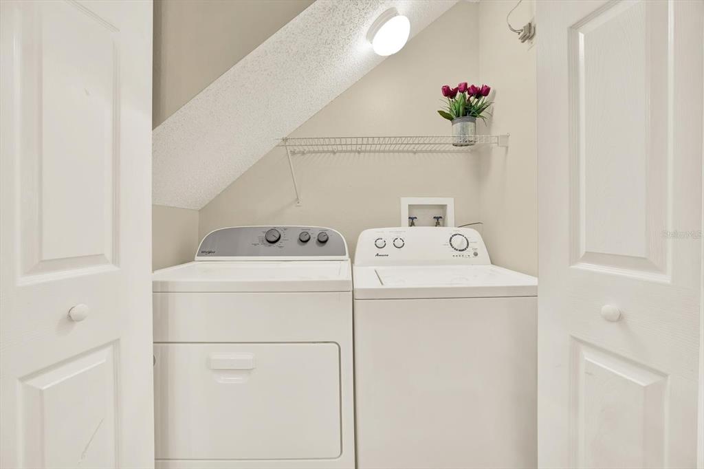 8541 Hunters Key Circle Tampa, FL 33647 - Photo 12 of 24 a utility room with dryer and washer
