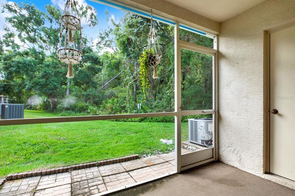 8541 Hunters Key Circle Tampa, FL 33647 - Photo 18 of 24 a view of a garden with an outdoor space