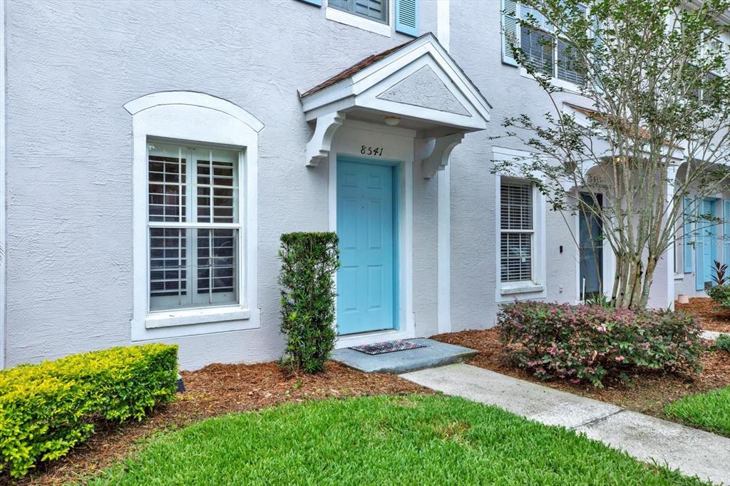 8541 Hunters Key Circle Tampa, FL 33647 - Photo 2 of 24 a front view of a house with garden