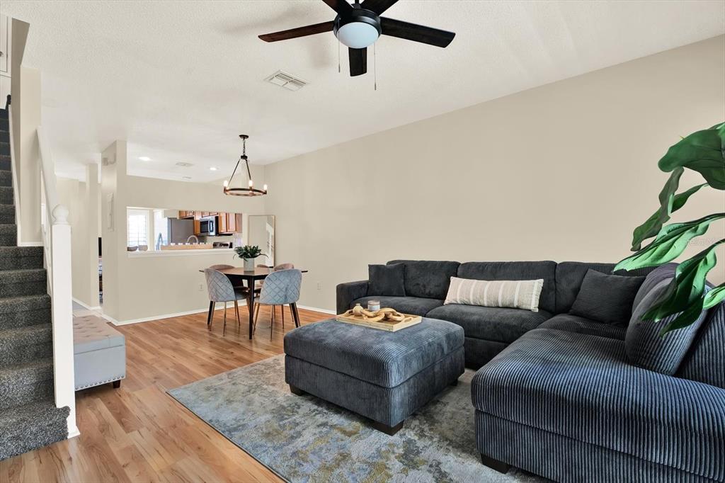 8541 Hunters Key Circle Tampa, FL 33647 - Photo 5 of 24 a living room with furniture and kitchen view