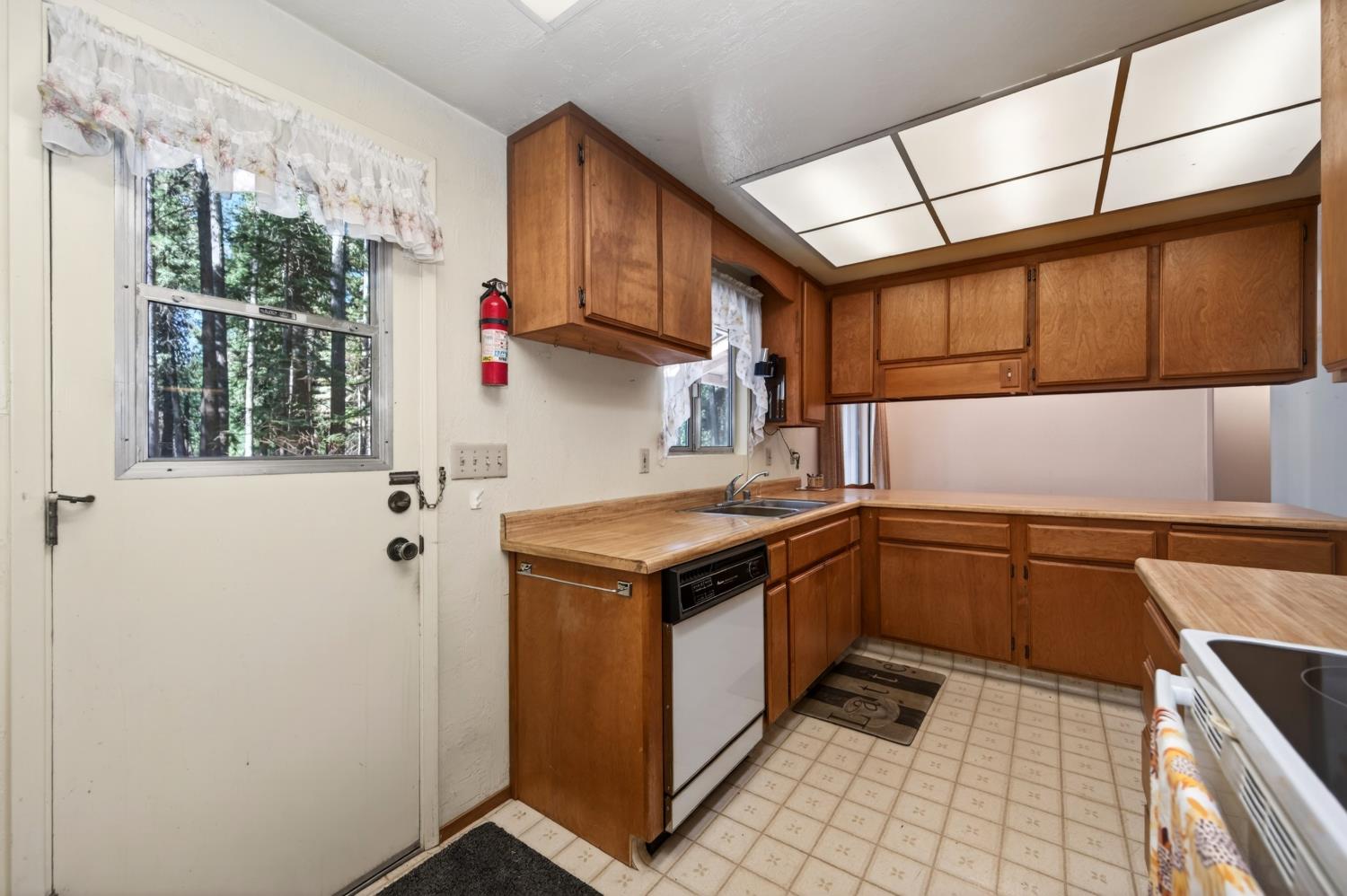 20191 Kit Court Volcano, CA 95689 - Photo 30 of 54 a kitchen with a stove and a sink