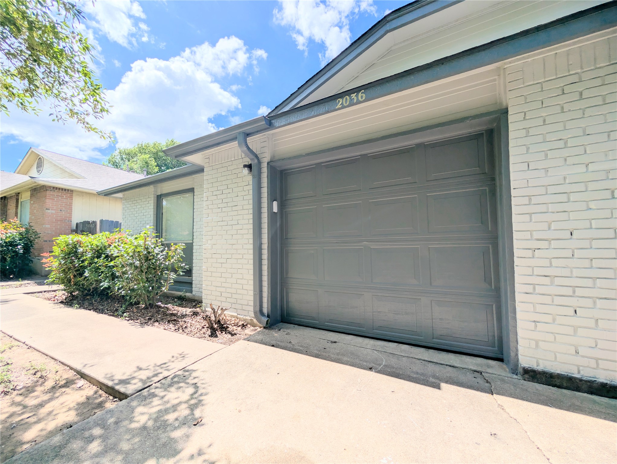 2036 Redwing Way Round Rock, TX 78664 - Photo 2 of 23 A classic brick exterior, new paint, offers enduring curb appeal and a welcoming facade.