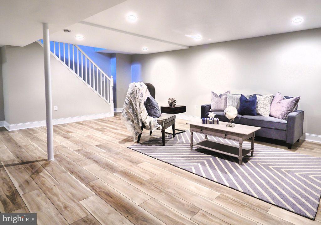 13612 Brookline Road Baldwin, MD 21013 - Photo 25 of 44 Lower Level Family Room w/ New Luxury Vinyl Plank
