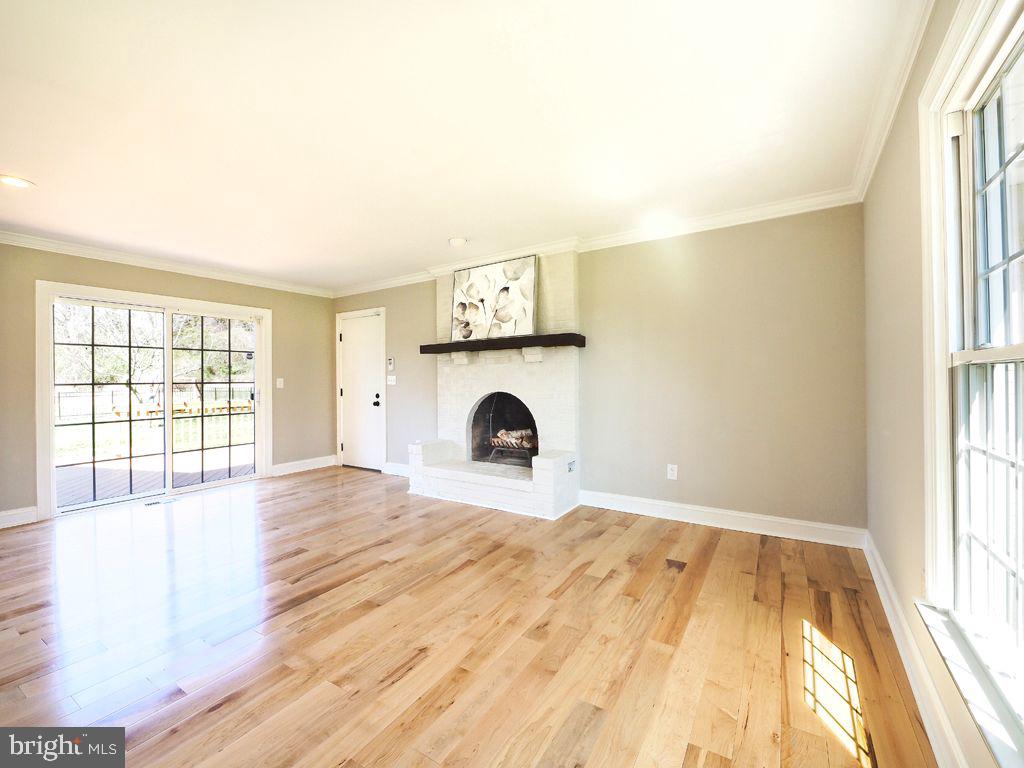 13612 Brookline Road Baldwin, MD 21013 - Photo 5 of 44 Main Level Family Room w/ Wood Burning Fireplace
