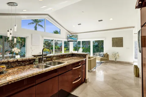 a kitchen with a sink and counter top space