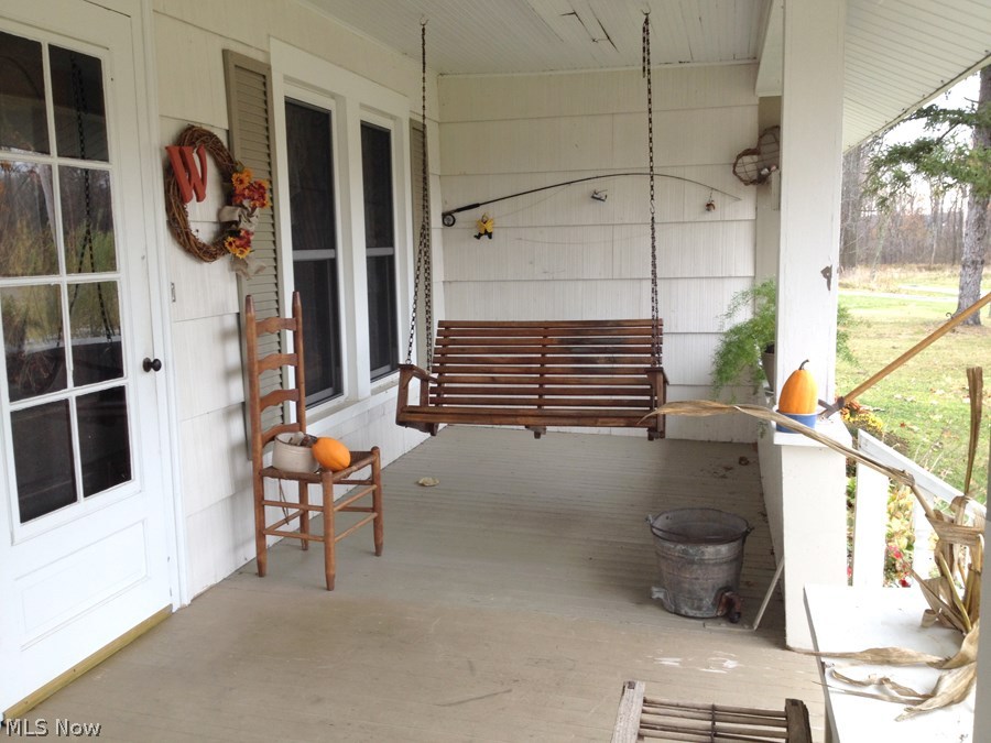 5650 Leroy Road Wakeman, OH 44889 - Photo 2 of 25 Inviting front porch