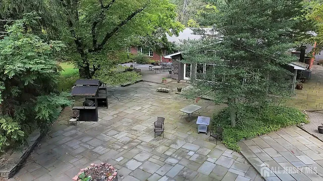 a view of a pathway with a patio