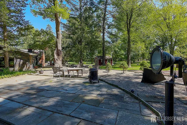 a view of a park with swings and slides