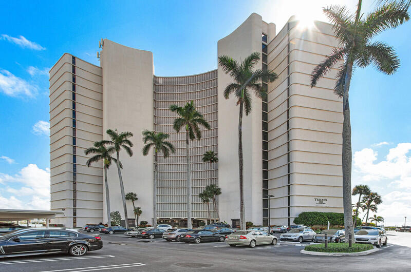 a view of a buildings with a street