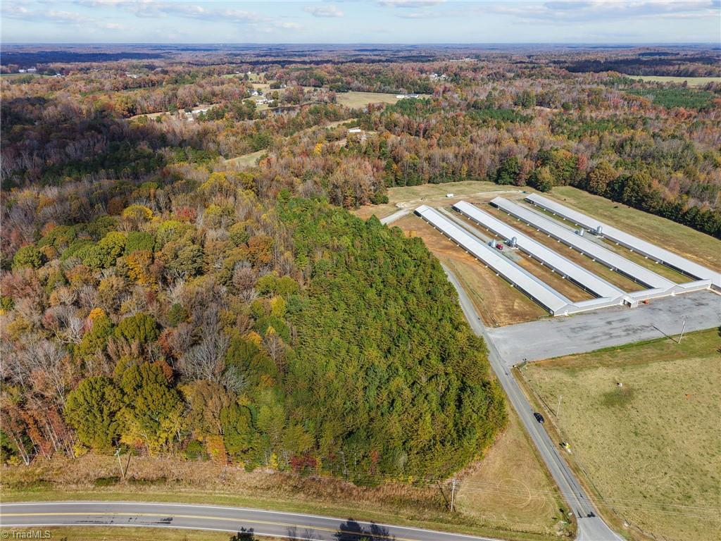 0 Timber Ridge Lake Road Liberty, NC 27298 - Photo 2 of 18 Aerial view of vacant land and Chicken farm next door.