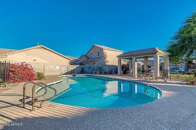a view of a house with swimming pool