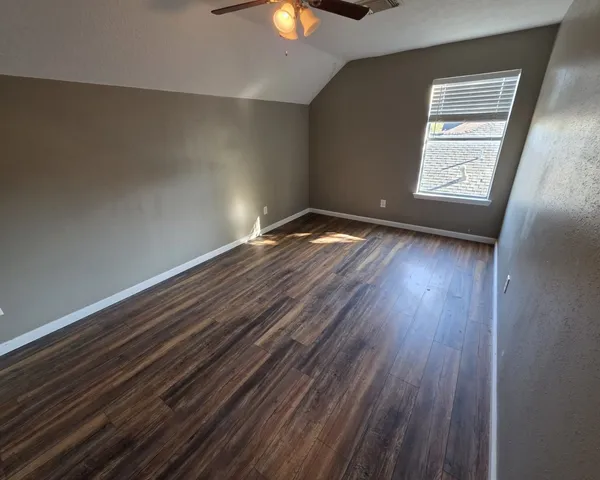 a bathroom with a sink a toilet and bathtub