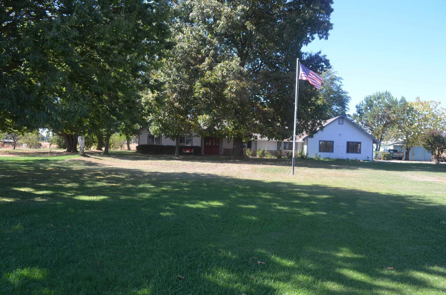 9534 Tavernor Road Wilton, CA 95693 - Photo 1 of 1 a house view with a play ground in front of it
