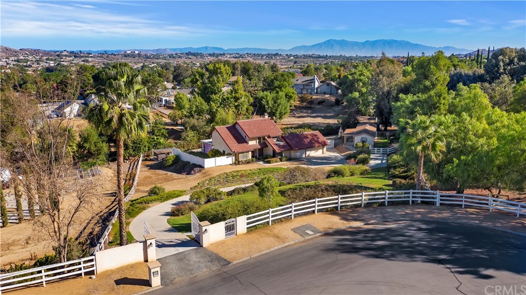 17130 Singingbird Lane Riverside, CA 92504 - Photo 1 of 1 an aerial view of residential houses with outdoor space