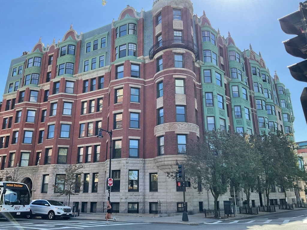 4 Charlesgate East, Unit 107 Boston, MA 02215 - Photo 9 of 23 a large building with a clock on it