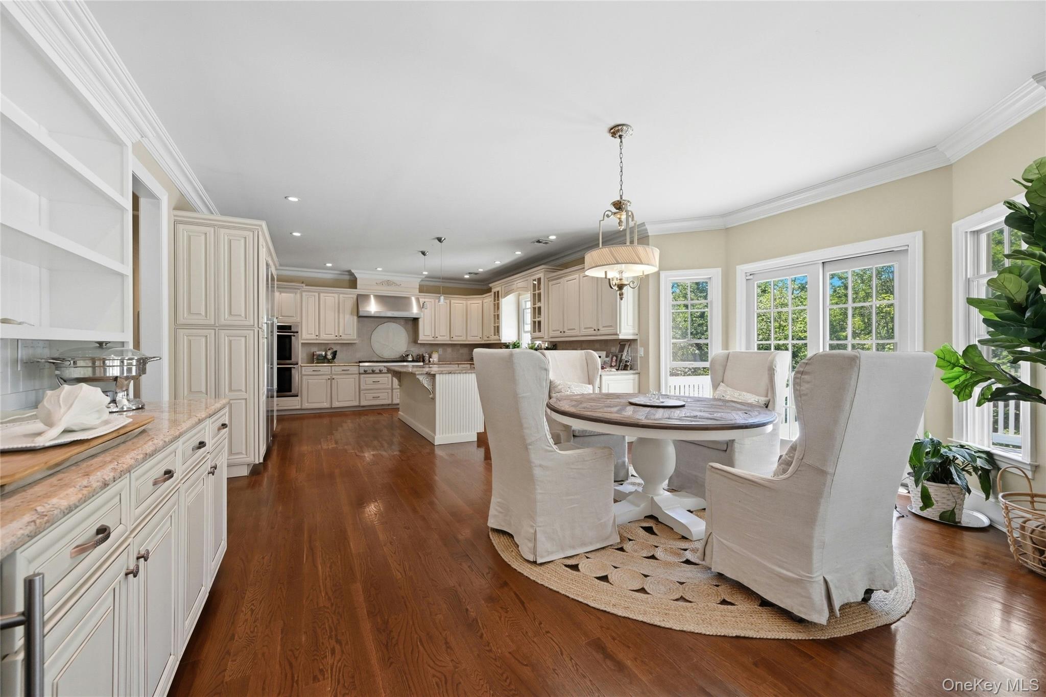 1330 Ridge Road Laurel Hollow, NY 11791 - Photo 14 of 47 Large Bright Kitchen with French Doors to Outside Deck and New Pergola