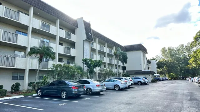 a cars parked in front of a building
