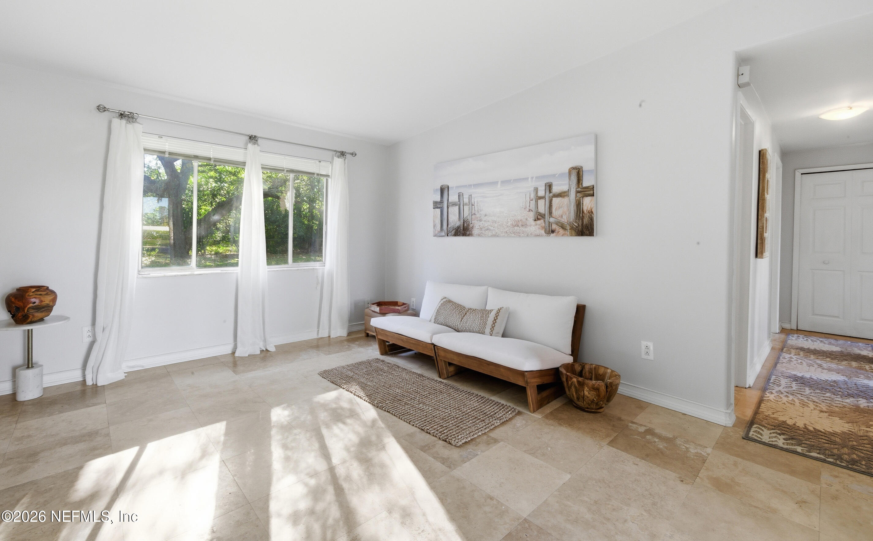 147 Knight Boxx Road Middleburg, FL 32068 - Photo 8 of 30 a bedroom with a bed and a window