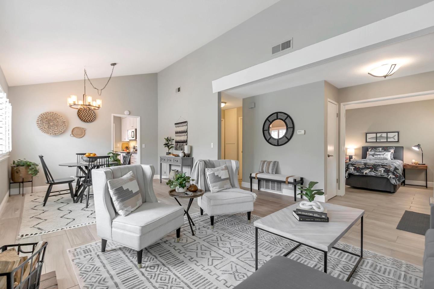 a living room with furniture and a table