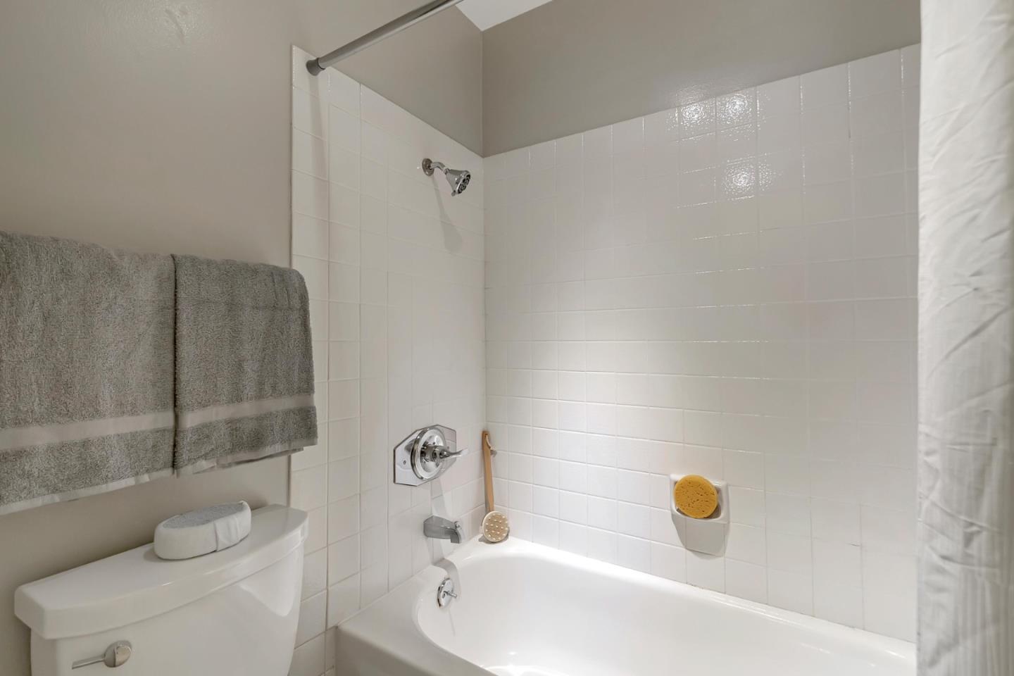 6609 Folklore Court San Jose, CA 95120 - Photo 15 of 21 a bathroom with a sink and a tub