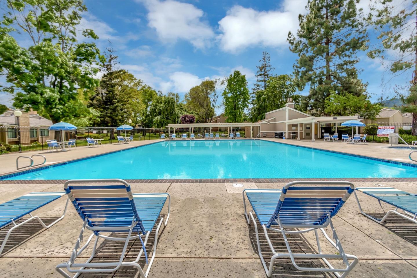 6609 Folklore Court San Jose, CA 95120 - Photo 19 of 21 a view of a swimming pool with lounge chairs
