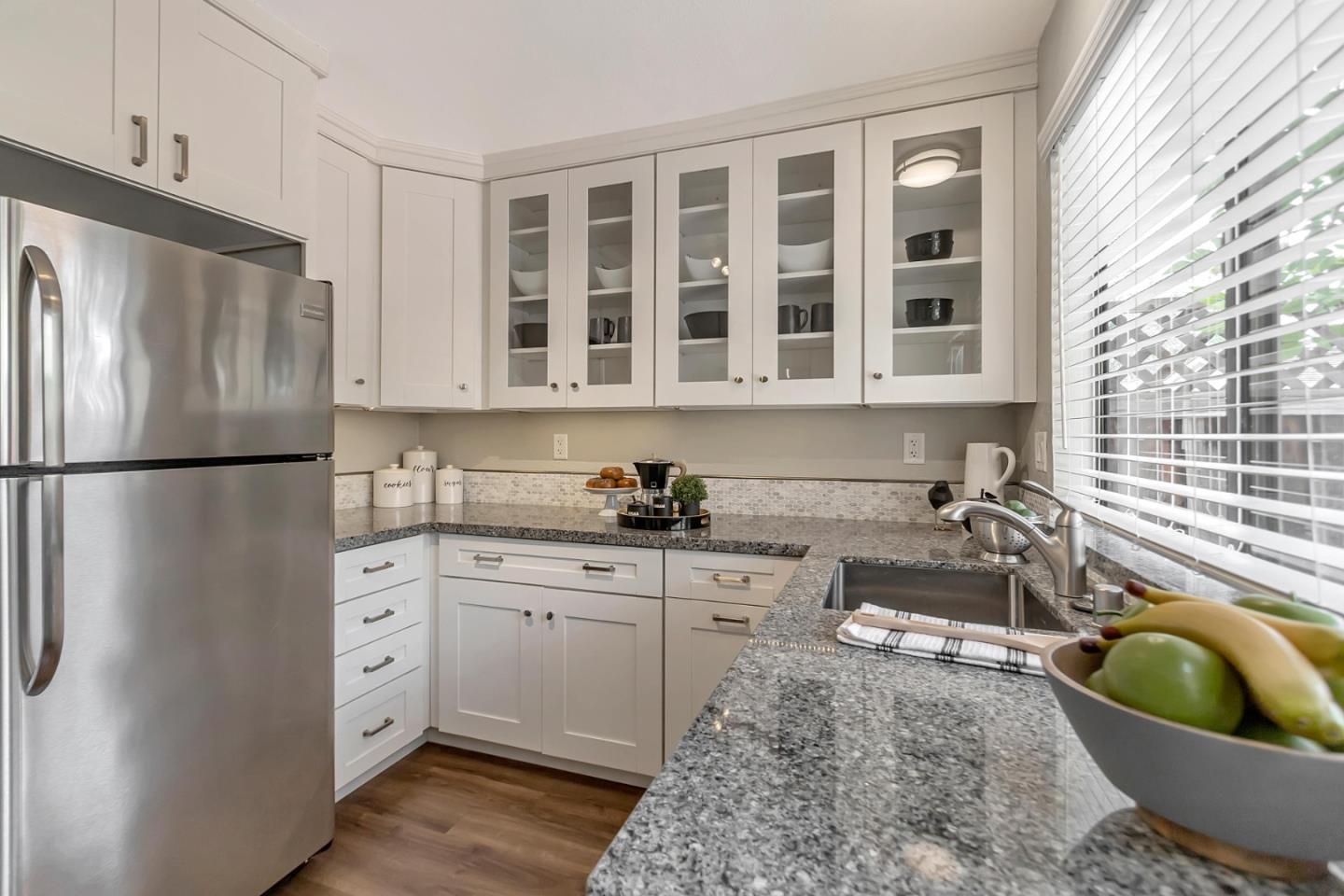 6609 Folklore Court San Jose, CA 95120 - Photo 6 of 21 a kitchen with a refrigerator and a sink