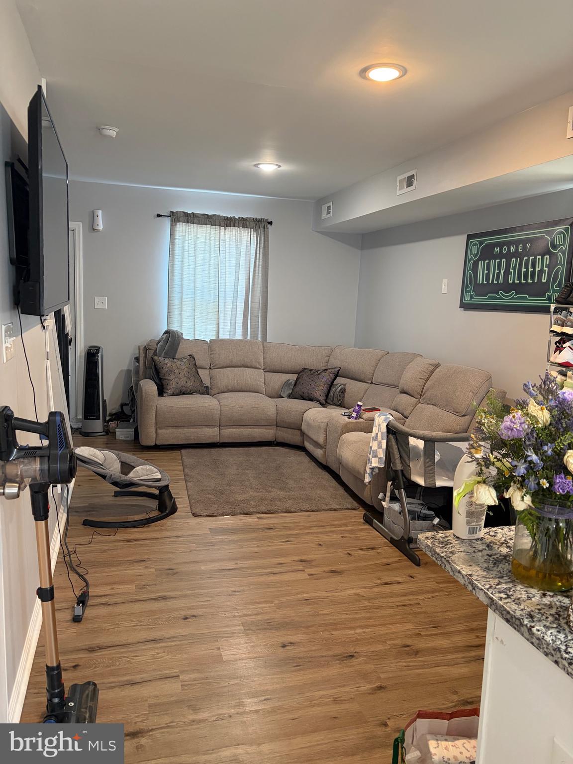 34 B Maynard Drive Sicklerville, NJ 08081 - Photo 3 of 24 a living room with furniture fireplace and flat screen tv