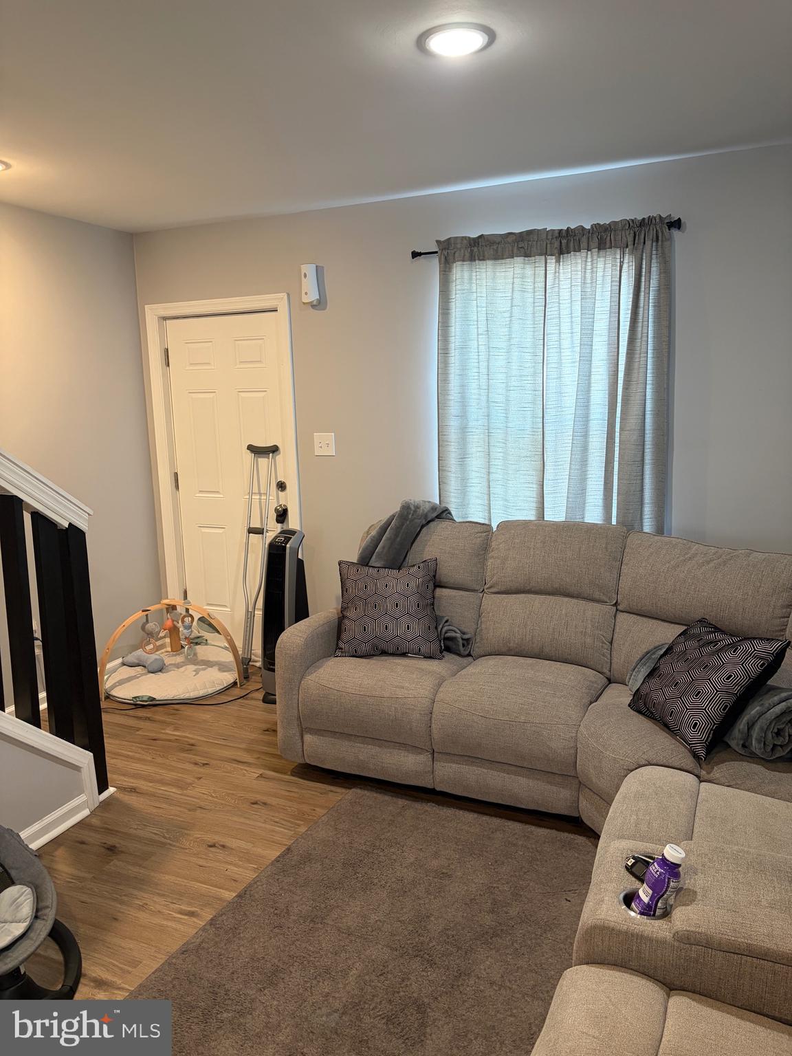 34 B Maynard Drive Sicklerville, NJ 08081 - Photo 4 of 24 a living room with furniture and a large window