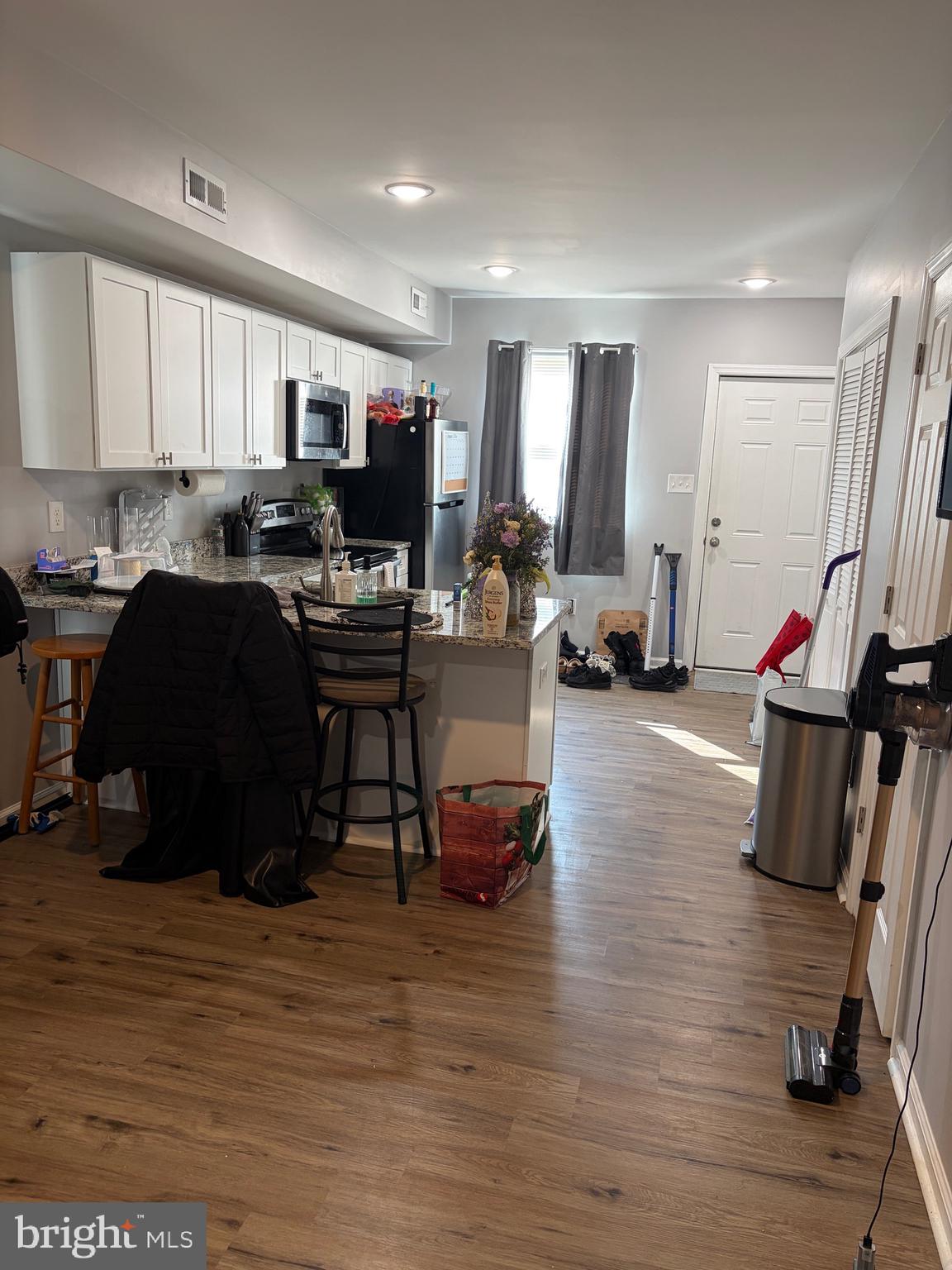 34 B Maynard Drive Sicklerville, NJ 08081 - Photo 5 of 24 a living room with furniture and a flat screen tv