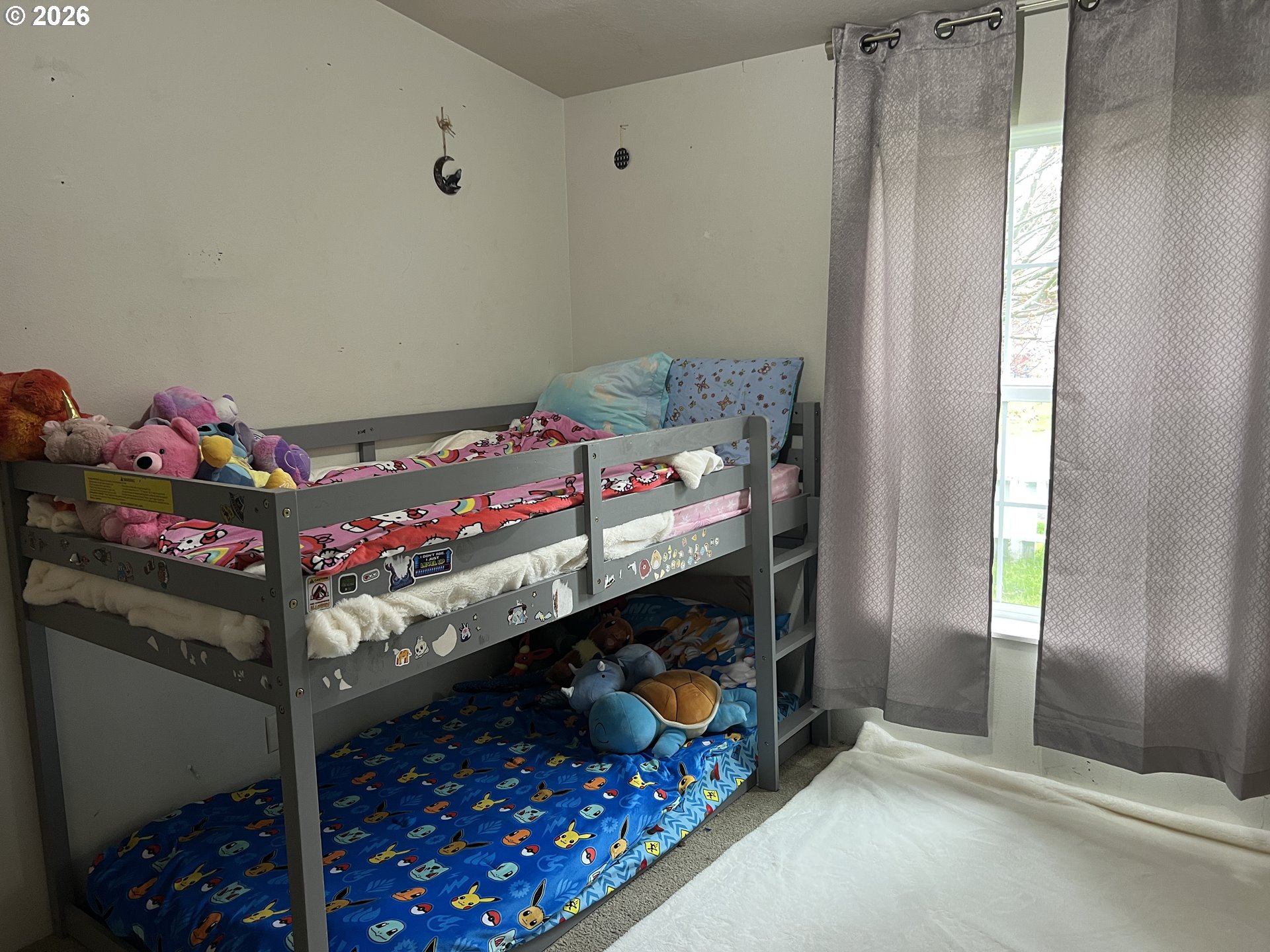 210 Northwest Grinstead Street Siletz, OR 97380 - Photo 21 of 29 a room with toys and a table