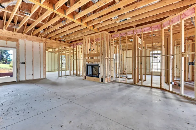 a view of a room with wooden walls
