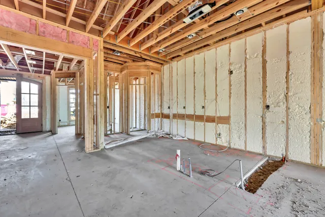 a view of an empty room with a sliding door